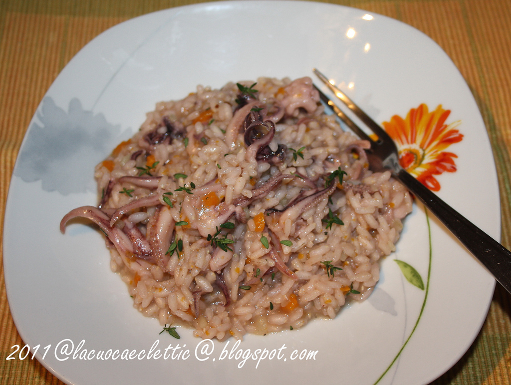 Risotto con ciuffi di calamari e timo....