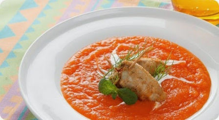 Calamari ripieni su crema di carote.