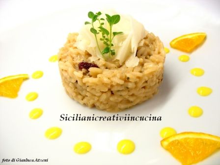 Risotto alle erbe aromatiche con mirtilli, raspadura e zabaione salato